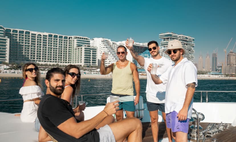 Business clients enjoying a yacht cruise in Dubai