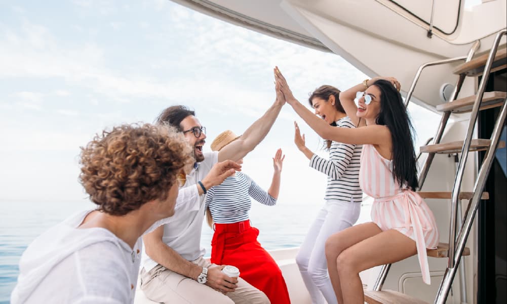 Luxury corporate event hosted on a yacht in Dubai with skyline backdrop