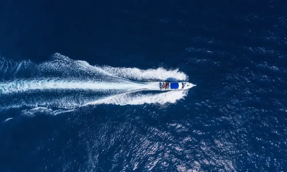 Luxury yachts cruising Dubai Marina with skyline views