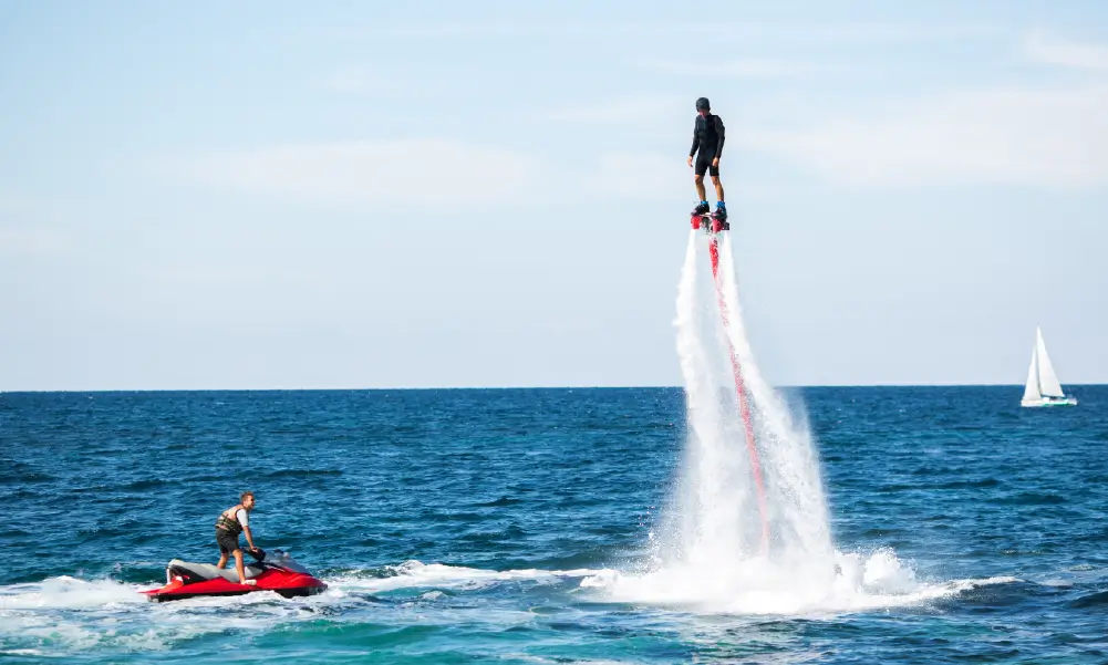 Guests enjoying watersports from a luxury yacht in Dubai