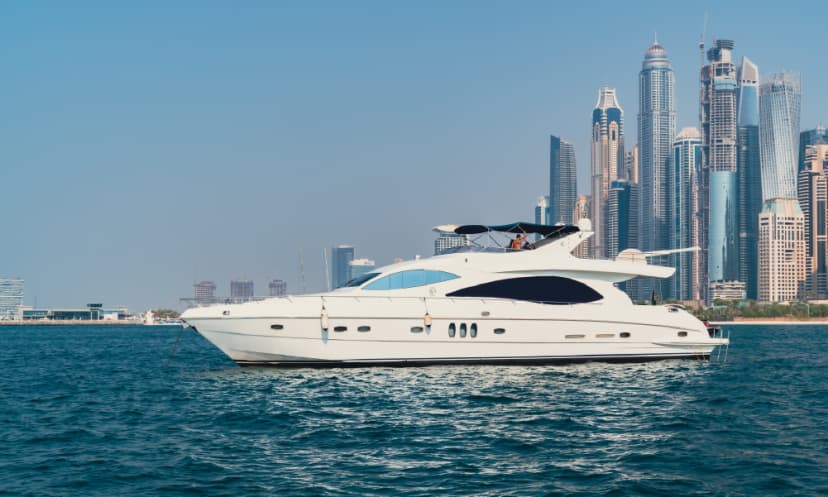 Yacht cruising in Dubai Marina with city views