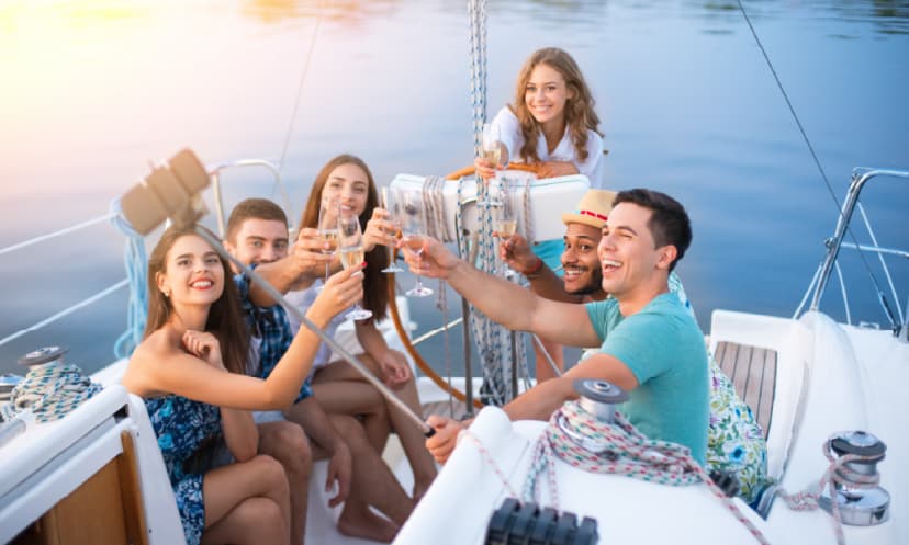 Friends party on a private yacht in Dubai