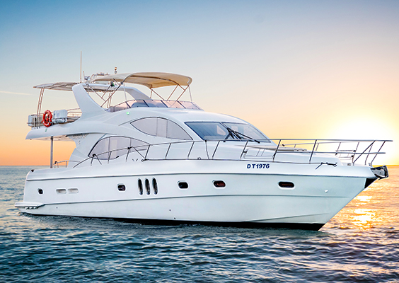 boat cruising near Ain Dubai during sunset